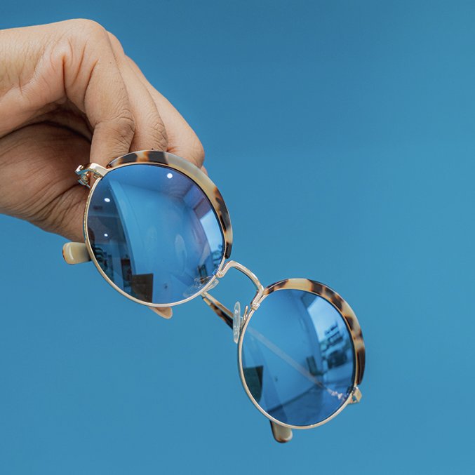 Round sunglasses with blue mirrored lenses